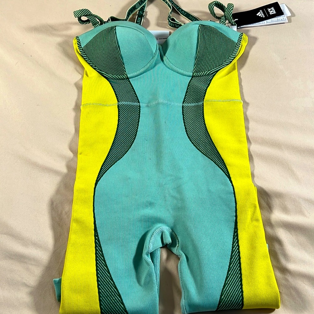 This brand-new Ivy Park jumpsuit of yellow, light blue, and a hint of green.